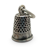 Brocosi.com antiqued sterling silver thimble charm with textured pitted surface and polished band