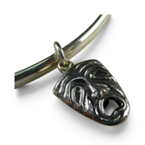 Brocosi.com antiqued sterling silver comedy tragedy theater mask charm on a silver bracelet