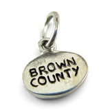 Brocosi.com vintage sterling silver oval Brown County charm with oxidized lettering for a bracelet or necklace.