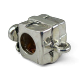 Brocosi.com sterling silver present charm bead with an antiqued finish and attachment loop for European bracelets.