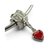 Brocosi.com sterling silver present charm bead with a dangling red heart charm on a European style bangle