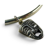Brocosi.com antiqued sterling silver comedy and tragedy theater mask charm on a silver bracelet