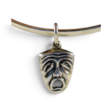 Brocosi.com antiqued sterling silver comedy tragedy theater mask charm on a thin silver bracelet