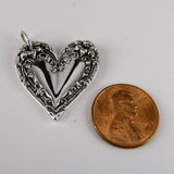 Casual Elegance Sterling Silver Vine Design Heart Pendant